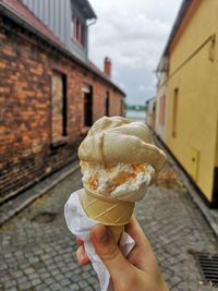 Woman holding ice cream cone