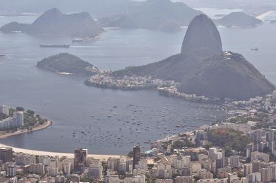 High angle view of city by sea