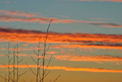 Scenic view of dramatic sky at sunset