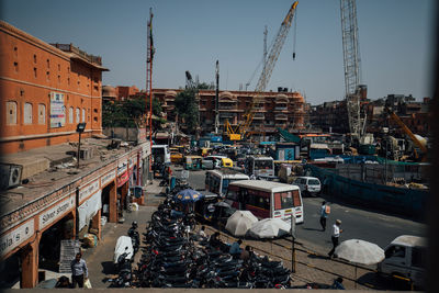 High angle view of buildings in city against sky