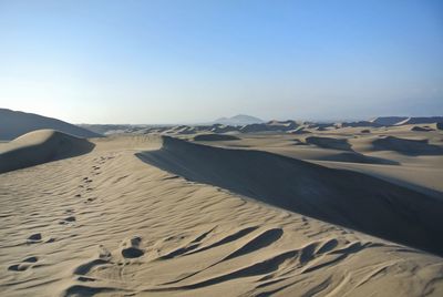 Scenic view of desert against sky