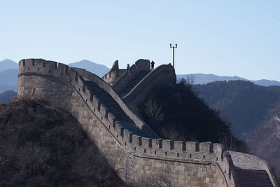 Great wall of china on mountain against clear sky