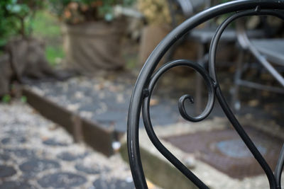 Close-up of bicycle on footpath