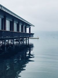 Pier over sea against sky