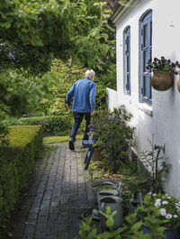 Man walking near house