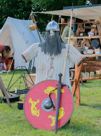 Man in traditional windmill on field