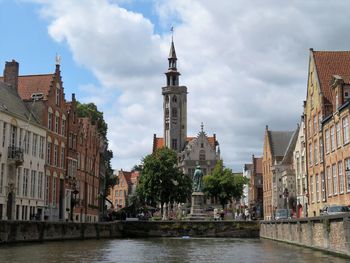 Buildings in city against sky