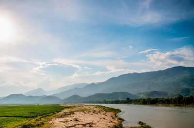 View of lake against cloudy sky