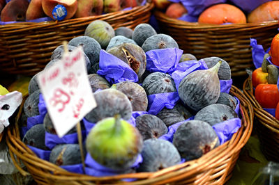 Close-up of figs in basket for sale