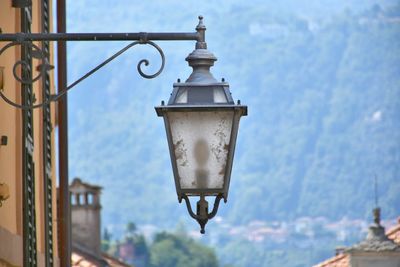 Close-up of lantern against sky