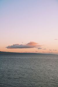 Scenic view of sea against clear sky during sunset