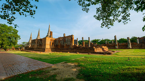 View of temple against building