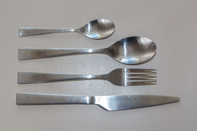 High angle view of drinking glasses on table