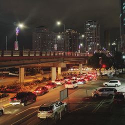 Traffic on road in city at night