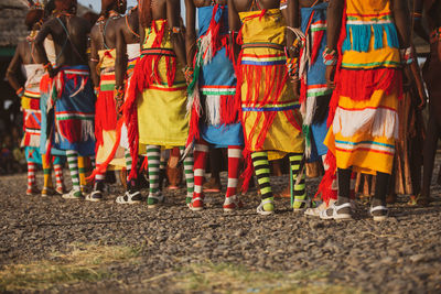 Turkana men wearing colourful traditional clothes