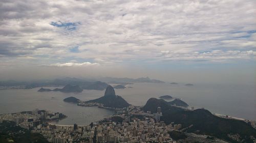 Aerial view of cityscape against sky