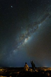 Scenic view of star field against sky at night