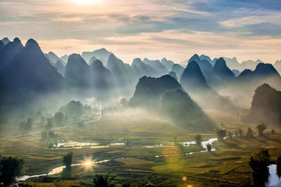 Panoramic view of mountains against sky during sunset