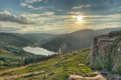 Scenic view of landscape against sky during sunset