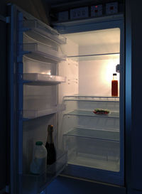 View of an open fridge