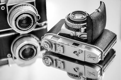 Close-up of cameras on table