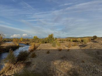 Scenic view of land against sky