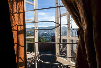 Buildings seen through glass window