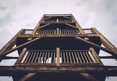 Low angle view of wooden structure at park against sky