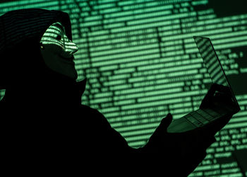 Shadow of man against wall