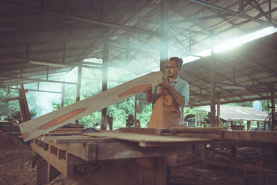 Man standing on ceiling