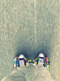 Low section of man skateboarding