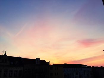 High section of building at sunset