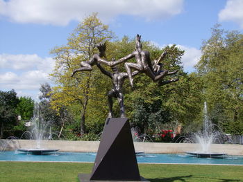 Close-up of fountain against trees in park