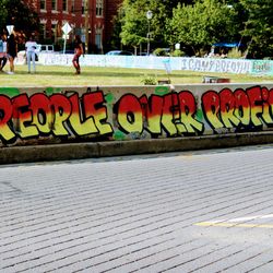 Graffiti on wall of footpath