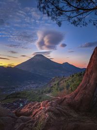 Scenic view of mountains against sky during sunset