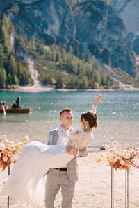 Couple kissing in water