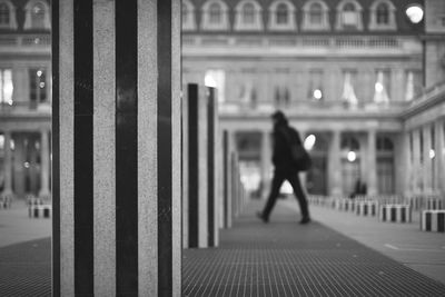 Woman walking on city street