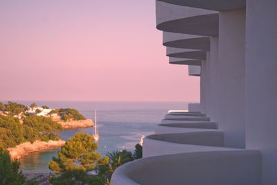 Scenic view of sea against clear sky during sunset