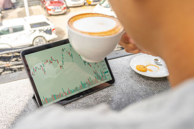 Close-up of coffee cup on table