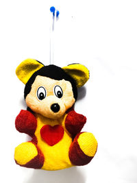 Close-up of stuffed toy against white background