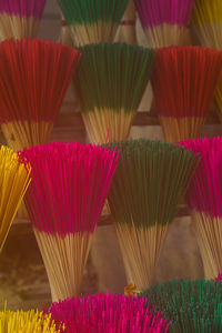 Full frame shot of multi colored incense sticks