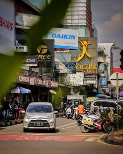 Cars on street in city