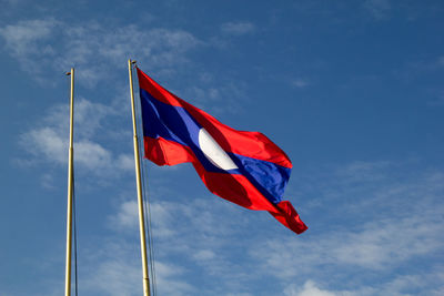 Low angle view of flag against sky