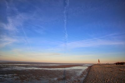 Scenic view of sea against sky during winter