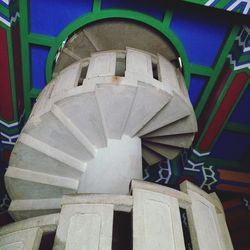 Low angle view of statue against building