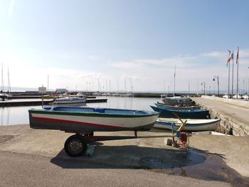 Boats moored at harbor