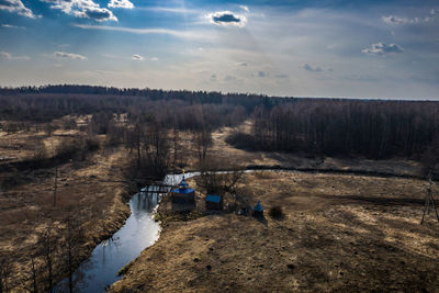 Scenic view of land against sky during winter