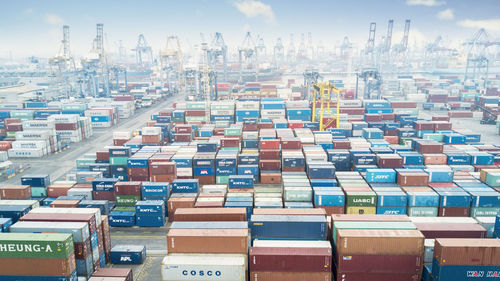 Aerial view of commercial dock against buildings in city