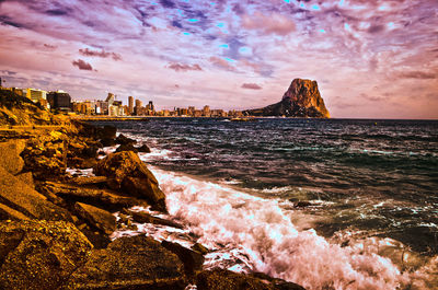 Scenic view of sea against cloudy sky