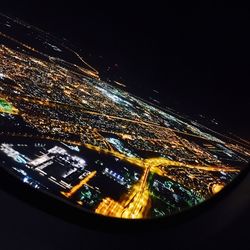 High angle view of illuminated city at night